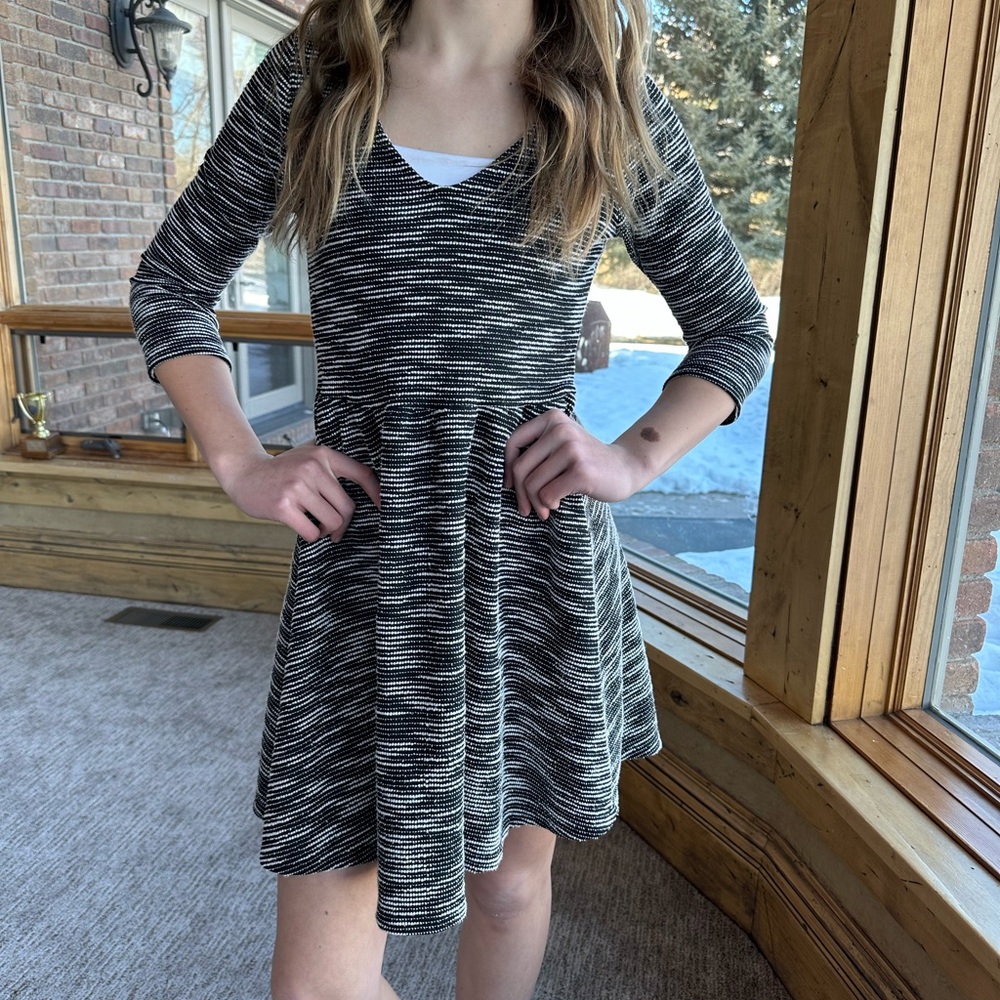 Francesca’s textured and feminine dress